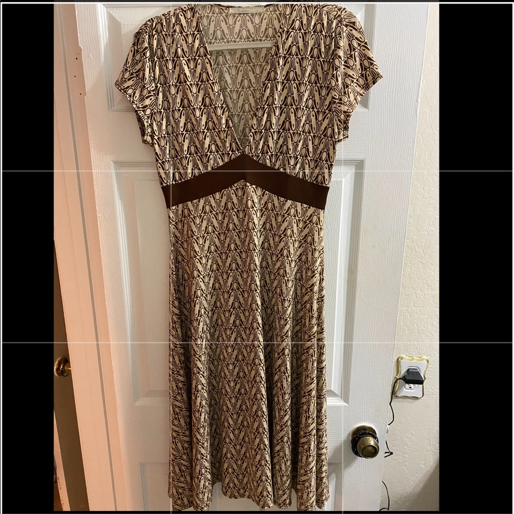 Very flattery dress.